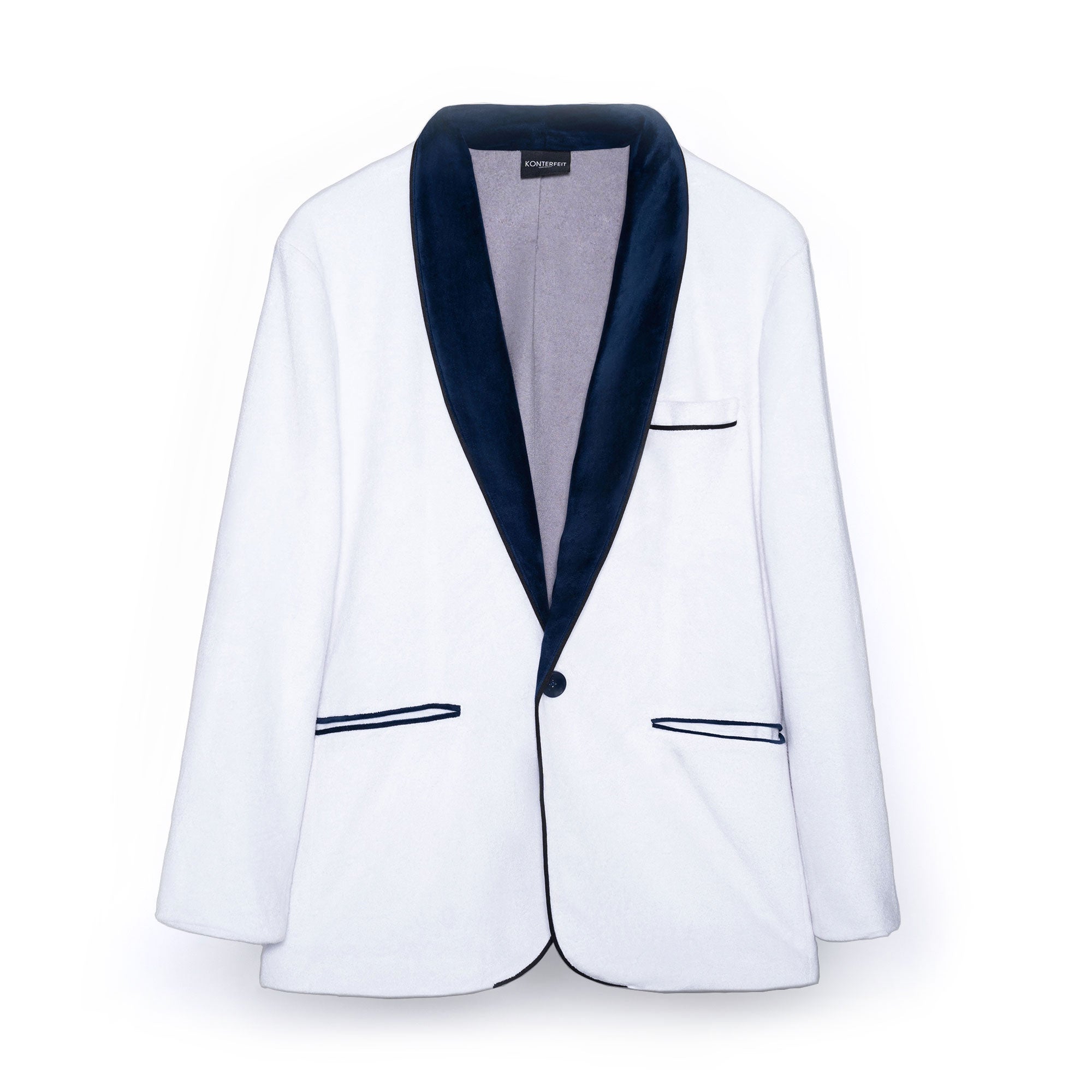 A white beach tuxedo bath robe with navy blue lapels and trim, featuring a single button closure and functional pockets. For yacht parties on boats and summers at the beach