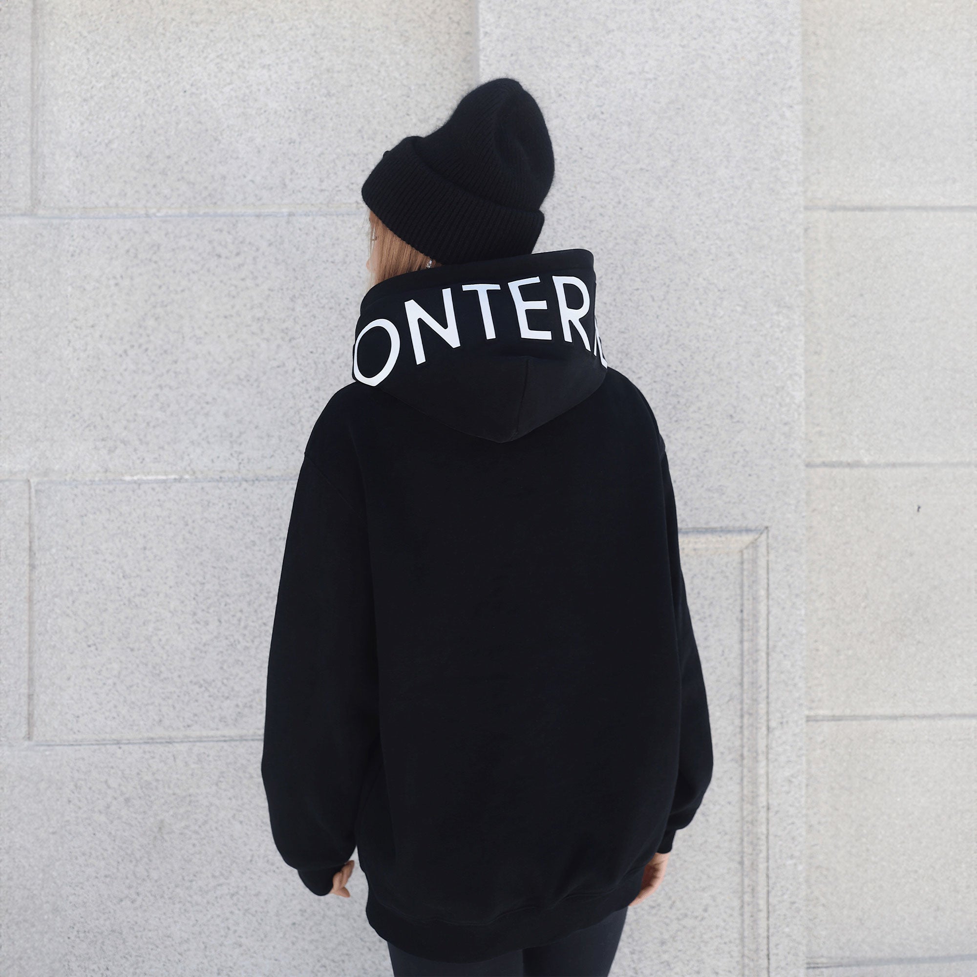 girl wearing black hoodie