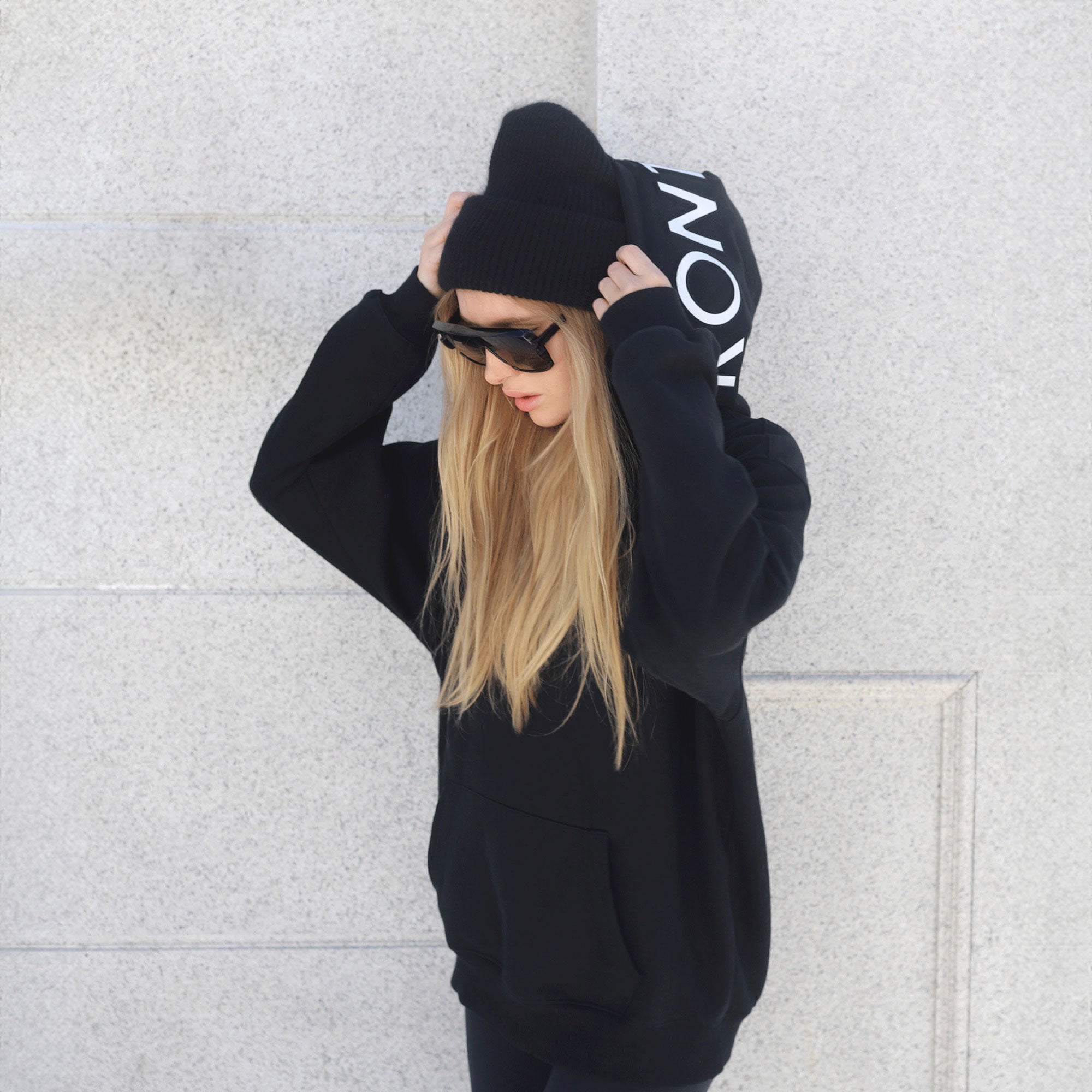 girl wearing black hoodie