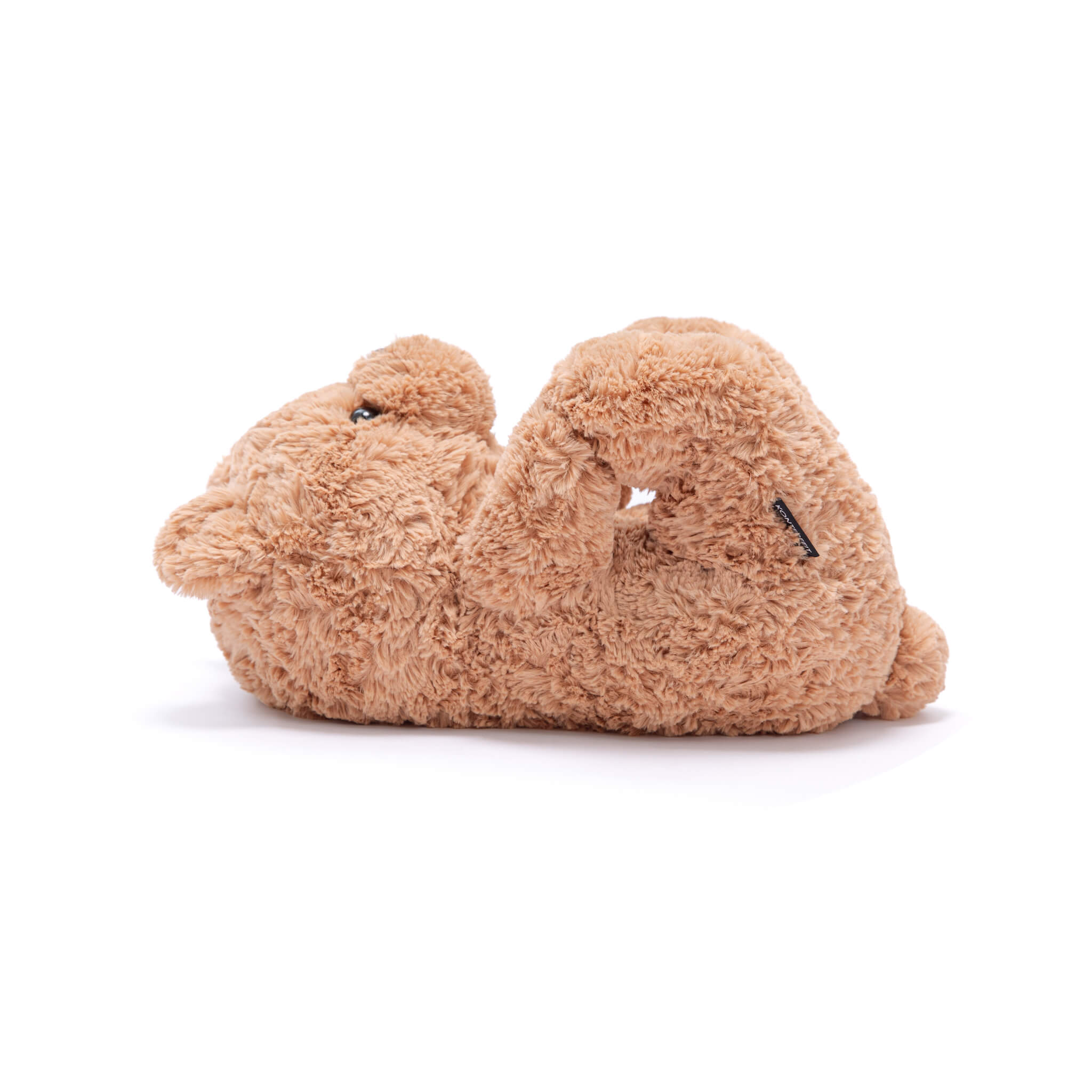 Pair of brown beige curly swirly teddy bear slippers shoes on a white background