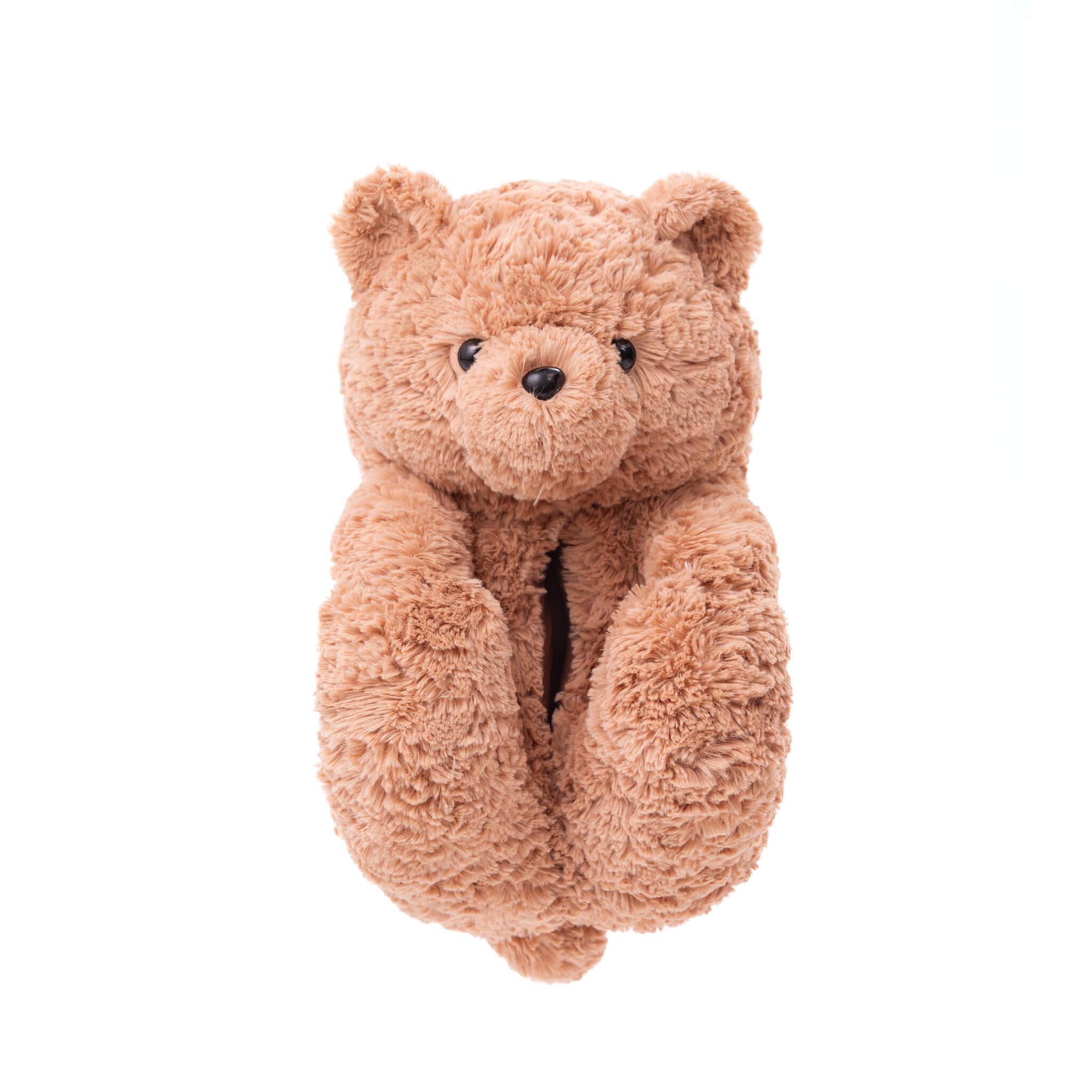 Pair of brown beige curly swirly teddy bear slippers shoes on a white background